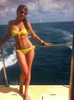 MFC LovelyKittie on boat in yellow bikini