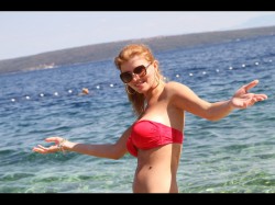 HotKittyDoll Deea in wet red bikini