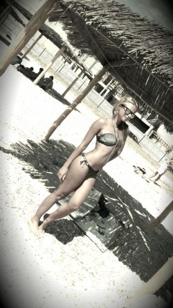 MFC MagicalMiss wearing a two piece bikini