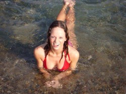 Kimmelicious in wet red bikini