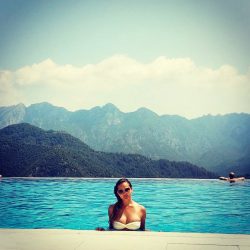 Chrissy Teigen in white bikini top