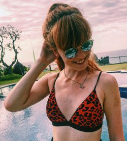 Dutch celebrity Jolijn Henneman in red and black animal print bikini top